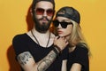 Fashion beautiful couple together. Tattoo Hipster boy and girl Royalty Free Stock Photo