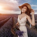 Fashion beautiful model in lavender field in sunset Royalty Free Stock Photo