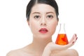 Fashion beauty asian woman holding chemistry makeup cosmetic liq