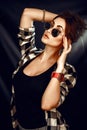 Fashion beauty girl wearing sunglasses, plaid shirt.