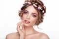 Fashion Beauty Model Girl with Flowers Hair. Bride. Perfect Creative Make up and Hair Style. Hairstyle. Royalty Free Stock Photo