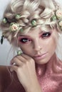 Fashion Beauty Model Girl with Flowers Hair. Bride. Perfect Creative Make up and Hair Style. Royalty Free Stock Photo