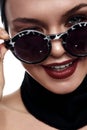 Fashion beauty Model holds Fingers Sunglasses Royalty Free Stock Photo