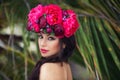 Fashion beauty portrait of beautiful brunette girl with wreath of flowers on her head Royalty Free Stock Photo