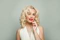 Fashion beauty portrait of elegant celebrity woman with makeup, manicure and blonde curly hair Royalty Free Stock Photo