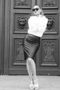 Fashion beauty and vogue. Woman in high heel shoes on red door in paris, france. woman in sunglasses with long hair