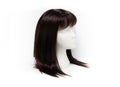 Fashion black color wig on white background Royalty Free Stock Photo