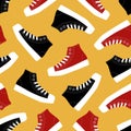 Fashion black and red sneakers in flat style vector illustration. Colorful sport shoes seamless pattern for fabric or wallpaper. Royalty Free Stock Photo
