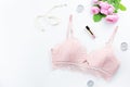 Woman elegant pink lace bra and panties, pumps and jewelry. Stylish lingerie flat lay. Royalty Free Stock Photo