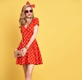 Fashion Blond Girl in Red Polka Dots Dress. Outfit Royalty Free Stock Photo