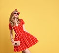 Fashion Blond Girl in Red Polka Dots Dress. Outfit Royalty Free Stock Photo