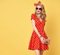 Fashion Blond Girl in Red Polka Dots Dress. Outfit Royalty Free Stock Photo