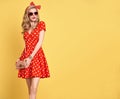 Fashion Blond Girl in Red Polka Dots Dress. Outfit Royalty Free Stock Photo