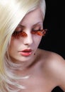 Fashion Blonde Model with Long Orange Eyelashes. Royalty Free Stock Photo