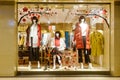 Fashion boutique displaying window with mannequins Royalty Free Stock Photo