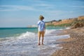 Fashion boy on the beach Royalty Free Stock Photo