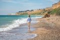 Fashion boy on the beach Royalty Free Stock Photo