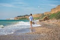 Fashion boy on the beach Royalty Free Stock Photo