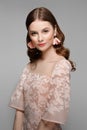 Fashion bride in peach lace dress. Clean fresh face of pretty girl with natural makeup Royalty Free Stock Photo