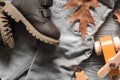 Fashion brown leather kids shoes, denim pants and accessories. a Royalty Free Stock Photo