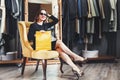 Fashion Brunette Girl With Yellow Shopping Bag Royalty Free Stock Photo