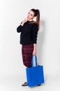 Fashion brunette woman with bag