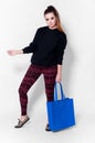 Fashion brunette woman with bag