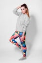 Fashion brunette woman in leggings