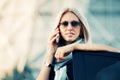 Fashion business woman calling on phone by her car Royalty Free Stock Photo