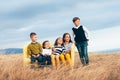 Fashion children in autumn field Royalty Free Stock Photo