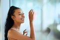 Fashion close-up portrait of young asian girl posing near to big window Royalty Free Stock Photo