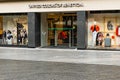 Fashion clothing store entrance of United Colors of Benetton. Kaunas, Lithuania, 7 September 2022 Royalty Free Stock Photo