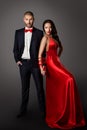 Fashion Couple, Woman Red Dress and Man in Black Suit, Hands Bounded