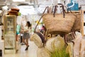 Wicker baskets and bags in home decor shop