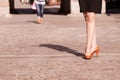 Fashion. Female legs in stylish shoes outdoor Royalty Free Stock Photo