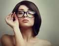 Fashion female model holding the hand glasses