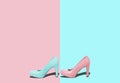Fashion female pink shoes with heels. Women`s footwear casual design on blue background with free space for text. Royalty Free Stock Photo