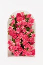 Fashion floral abstract stage with tiny pink roses as arch in rounded niche and podium mockup on white background for presentation