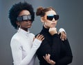 Fashion, futuristic and cyberpunk with women in sunglasses, young and trendy designer brand with gen z youth. Marketing