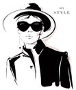 Fashion girl in black and white style. Fashion woman in black sunglasses. Stylish woman in black hat.