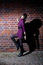 Fashion girl and brick wall Royalty Free Stock Photo