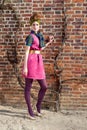 Fashion girl brick wall ivy Royalty Free Stock Photo