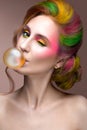 Fashion Girl with colored face and hair painted Royalty Free Stock Photo