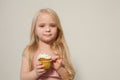 Fashion girl eats a candy lollipop cake Royalty Free Stock Photo