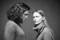 Fashion girl and guy in outlet yellow clothes posing in studio. Fashion couple each other.