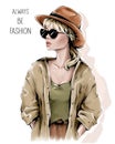Fashion girl in hat. Beautiful young woman in sunglasses.