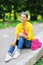 Fashion girl portrait. Beautiful happy woman in colorful clothes Royalty Free Stock Photo