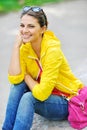 Fashion girl portrait. Beautiful happy woman in colorful clothes Royalty Free Stock Photo