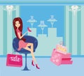 Fashion girl shopping in shoe shop Royalty Free Stock Photo