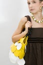 Fashion girl showing jewels and handbag Royalty Free Stock Photo